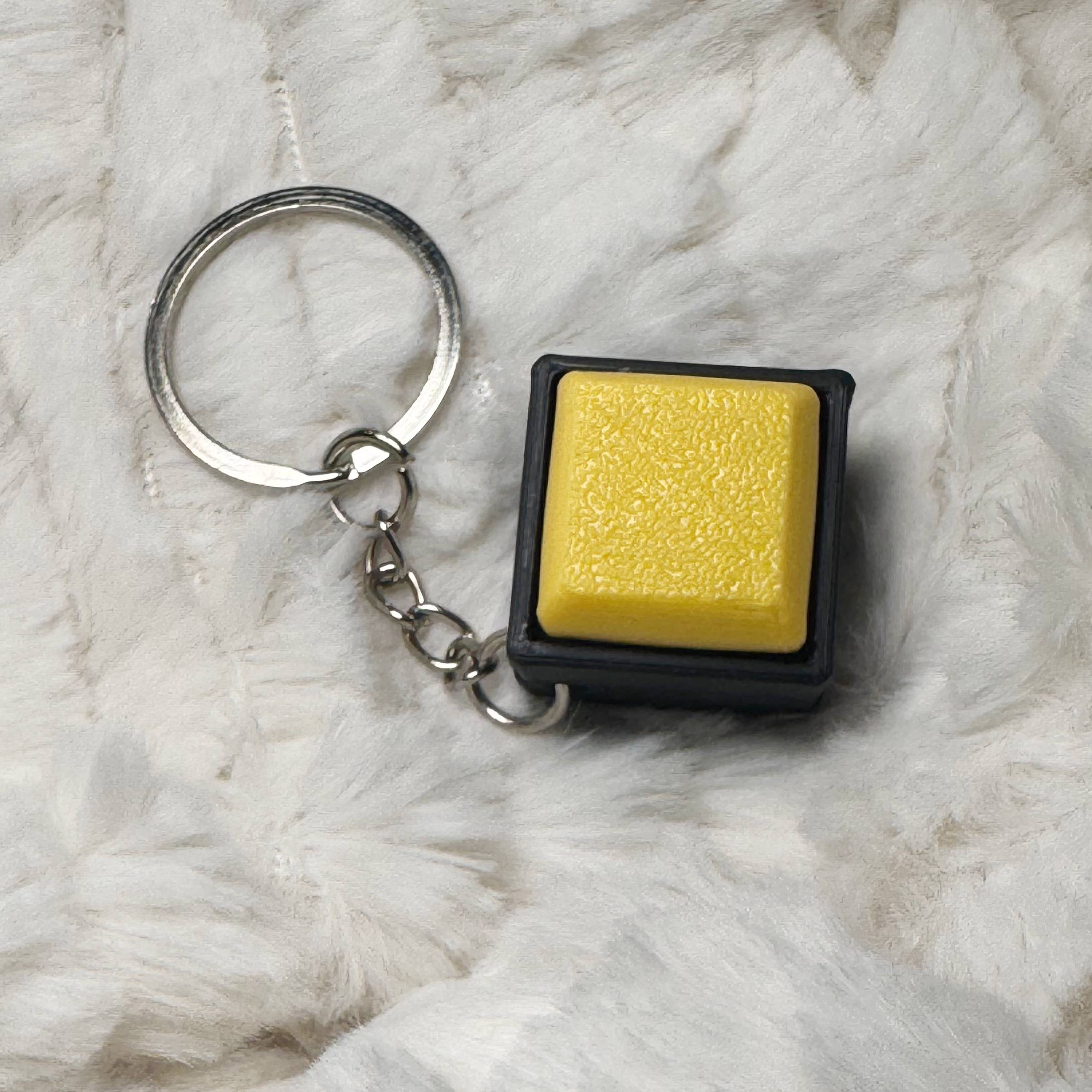1x1 3D Printed Fidget Clicker Keyring Black Base – Mechanical Keyboard Style Stress Toy ASMR - Pastel Yellow
