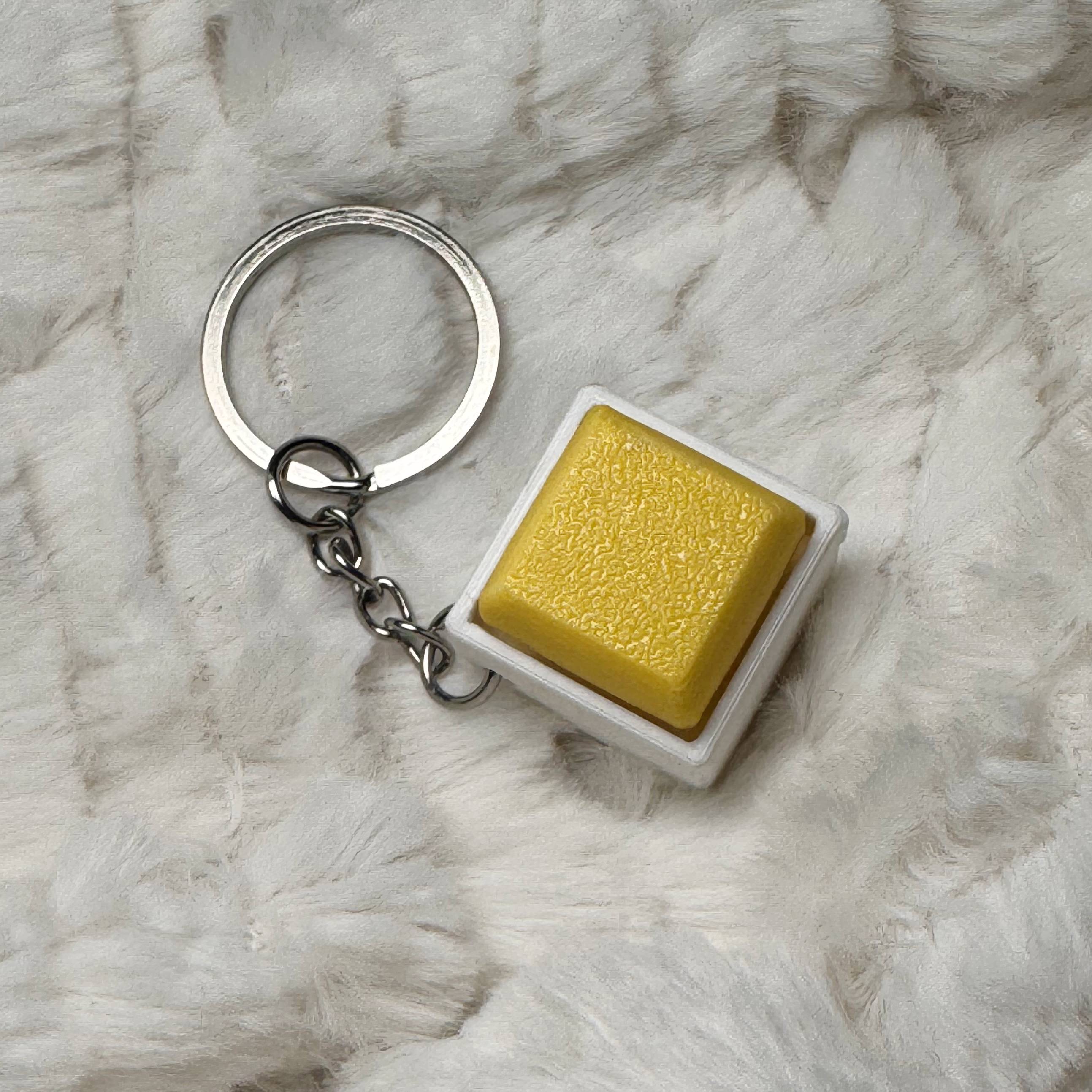 1x1 3D Printed Fidget Clicker Keyring White Base – Mechanical Keyboard Style Stress Toy ASMR - Pastel Yellow
